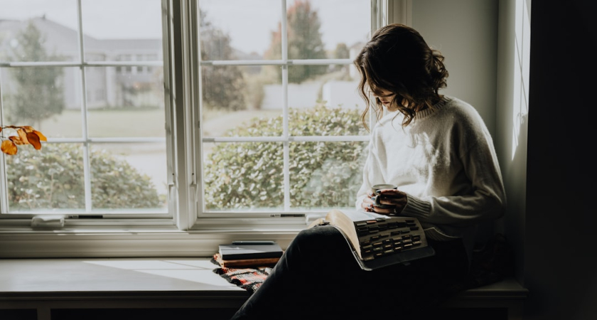 Adult relaxing at home while considering when to seek mental health support