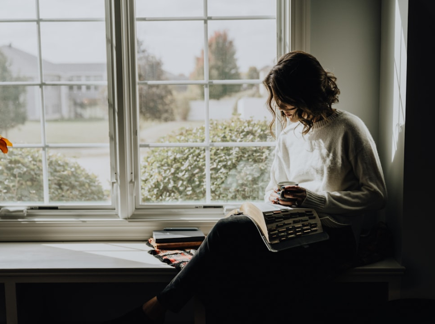 Adult relaxing at home while considering when to seek mental health support